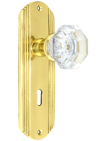 Streamline Moderne Mortise Lock Set With Waldorf Crystal Knobs in Polished Brass.